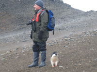 Gordon with Adelie penguin