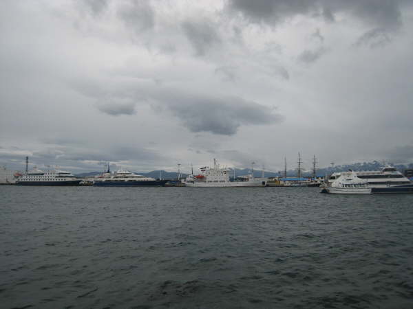 Grigoriy Mikheev (all-white) with other ships in Ushuaia