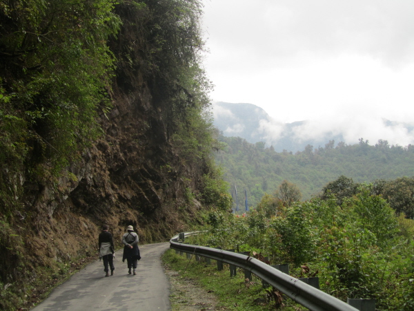 Sue and Ann taking their lives in their hands strolling down the middle of the main road