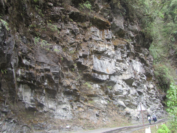 Cut-away cliff face to accommodate the road