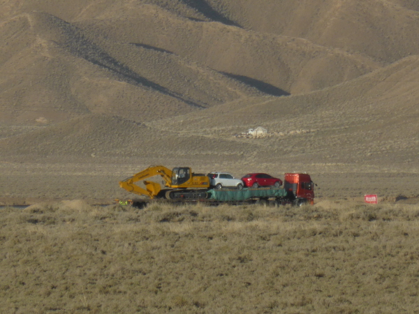 Two cars and a digger ...
