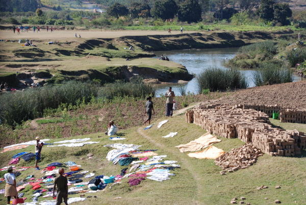Drying the washing and the hand-made bricks