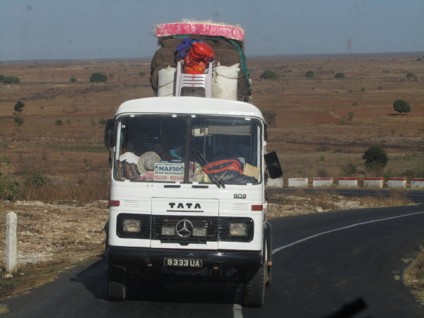 Bush-taxi complete with garden chairs on the roof