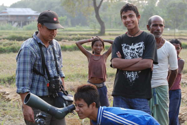 Nepalese children looking at Flying Foxes