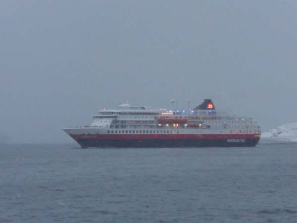 Finnmarken arriving at Vardo in the sleet