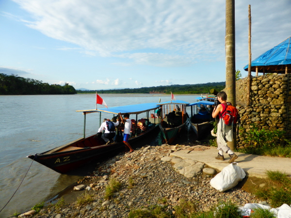 Boarding the boat on the Madre de Dios river