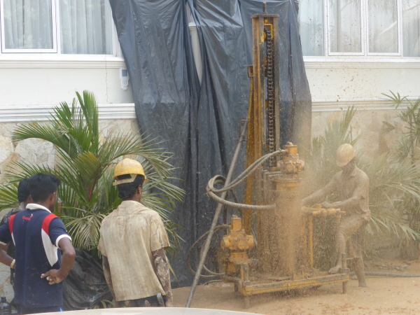 Drilling the well in the hotel courtyard while we were trying to enjoy a quiet lunch